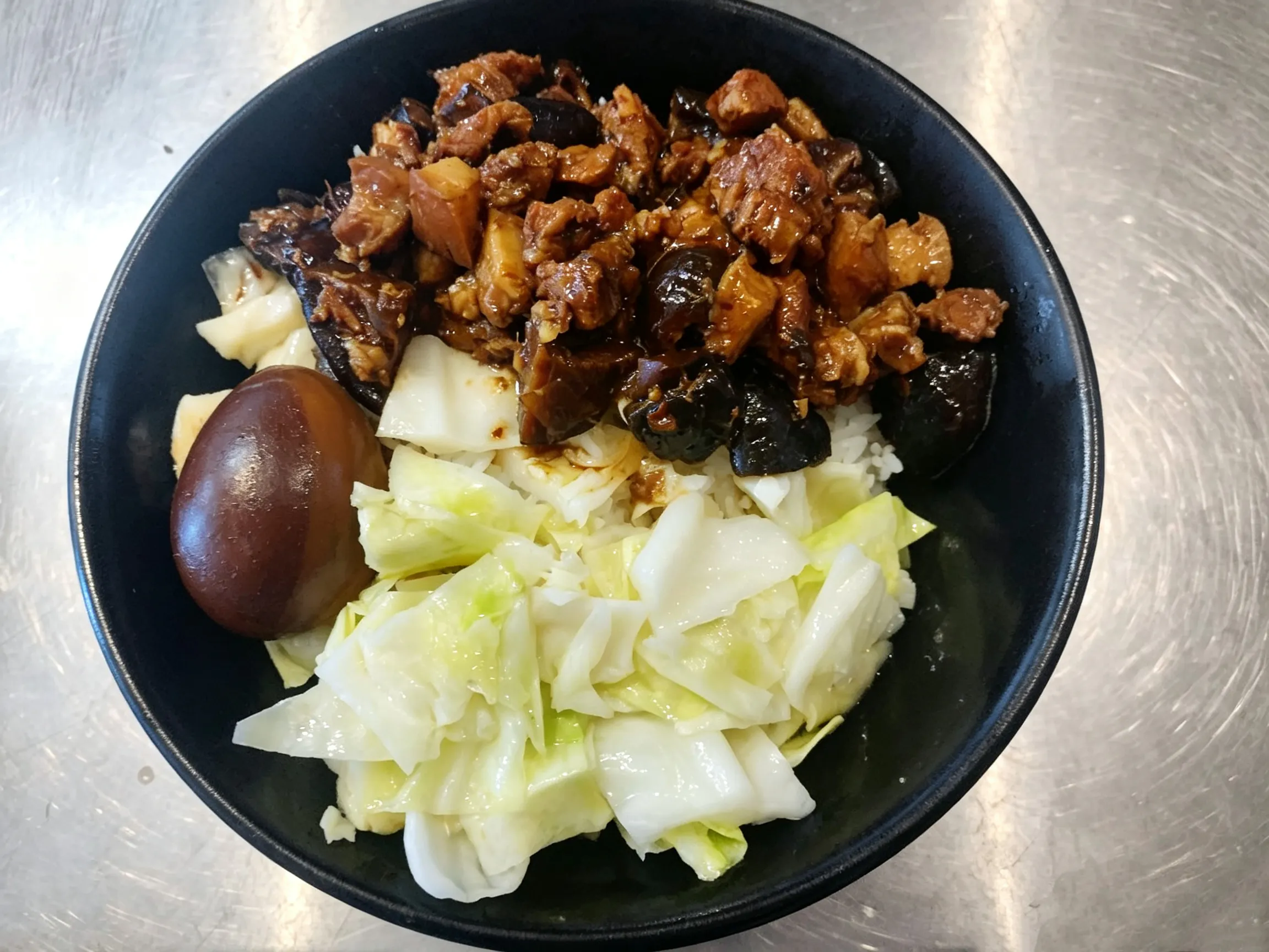 Braised mushroom pork rice with marinated egg and stir-fried cabbage at Yijia Kitchen，a Chinese Restaurant in Arcadia
